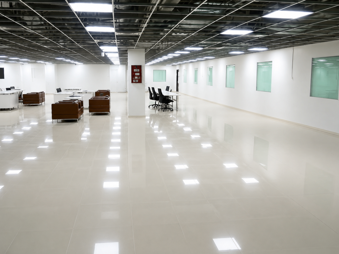 Finished open-plan office interior with tiled flooring