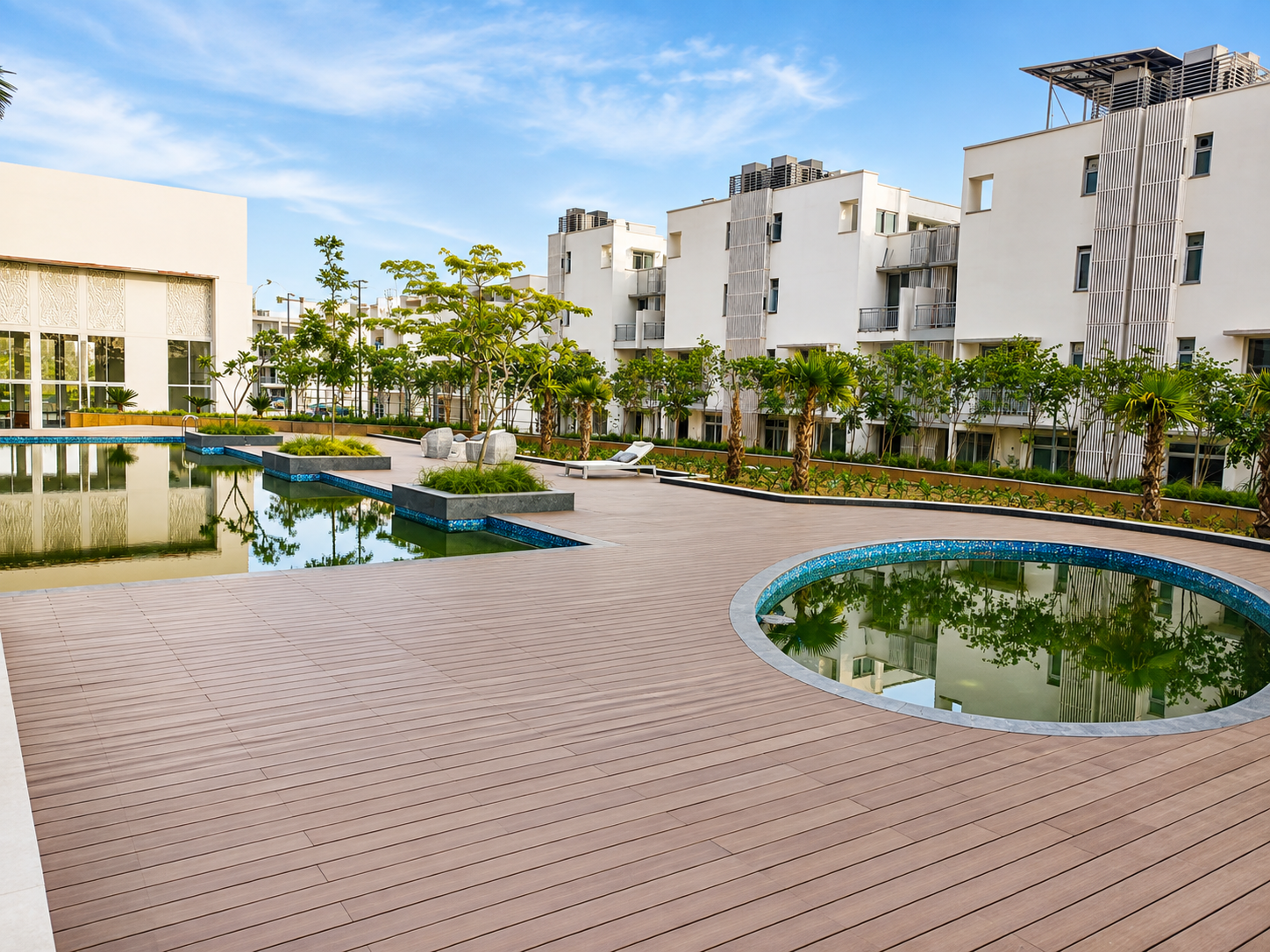 Composite deck plaza with water bodies and landscaped courtyard