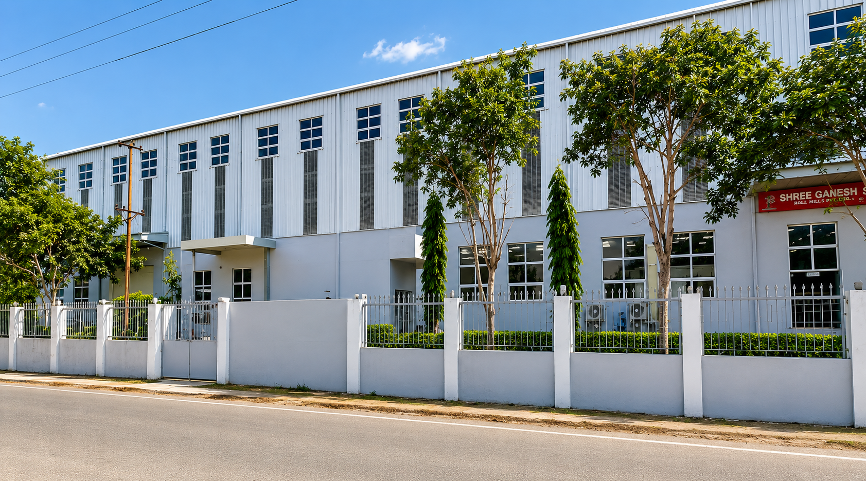 Boundary wall, fencing and external development along the factory frontage