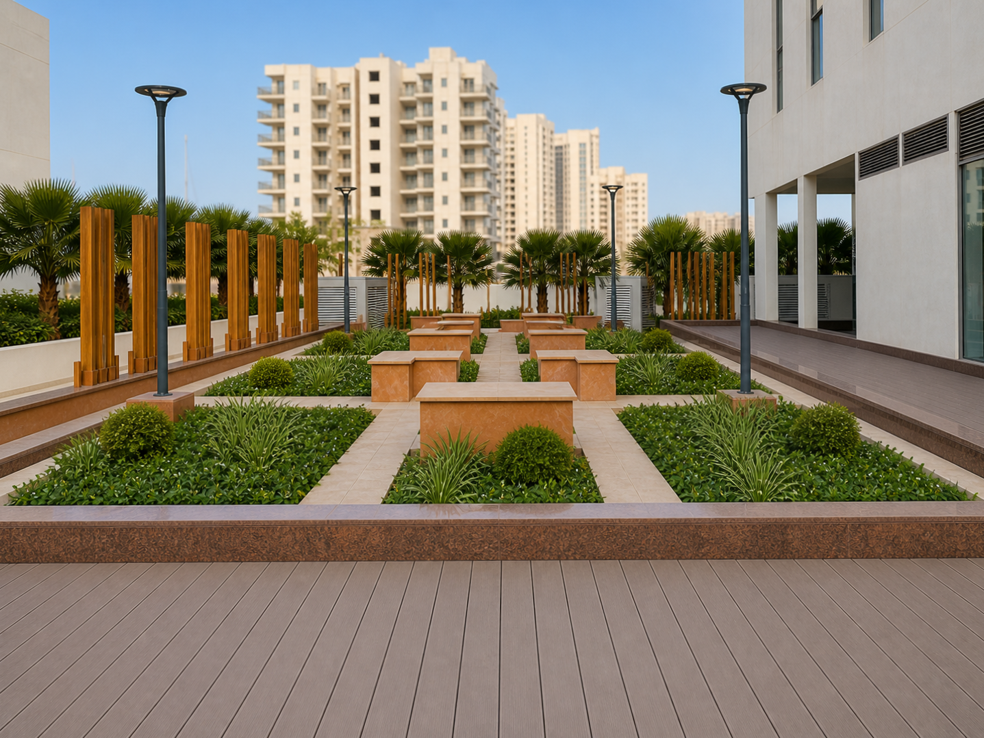 Landscaped courtyard with paved walkways, planters and timber screens at Godrej 101/Aria