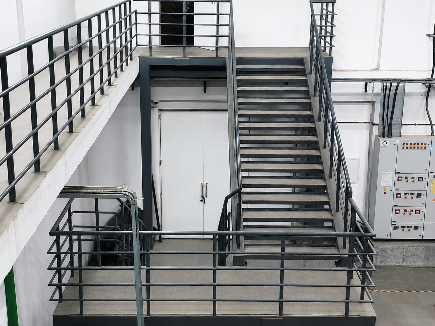 Steel staircase and mezzanine structure within the township utility building